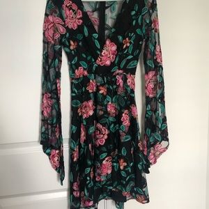 Black long sleeve dress with embroidered flowers